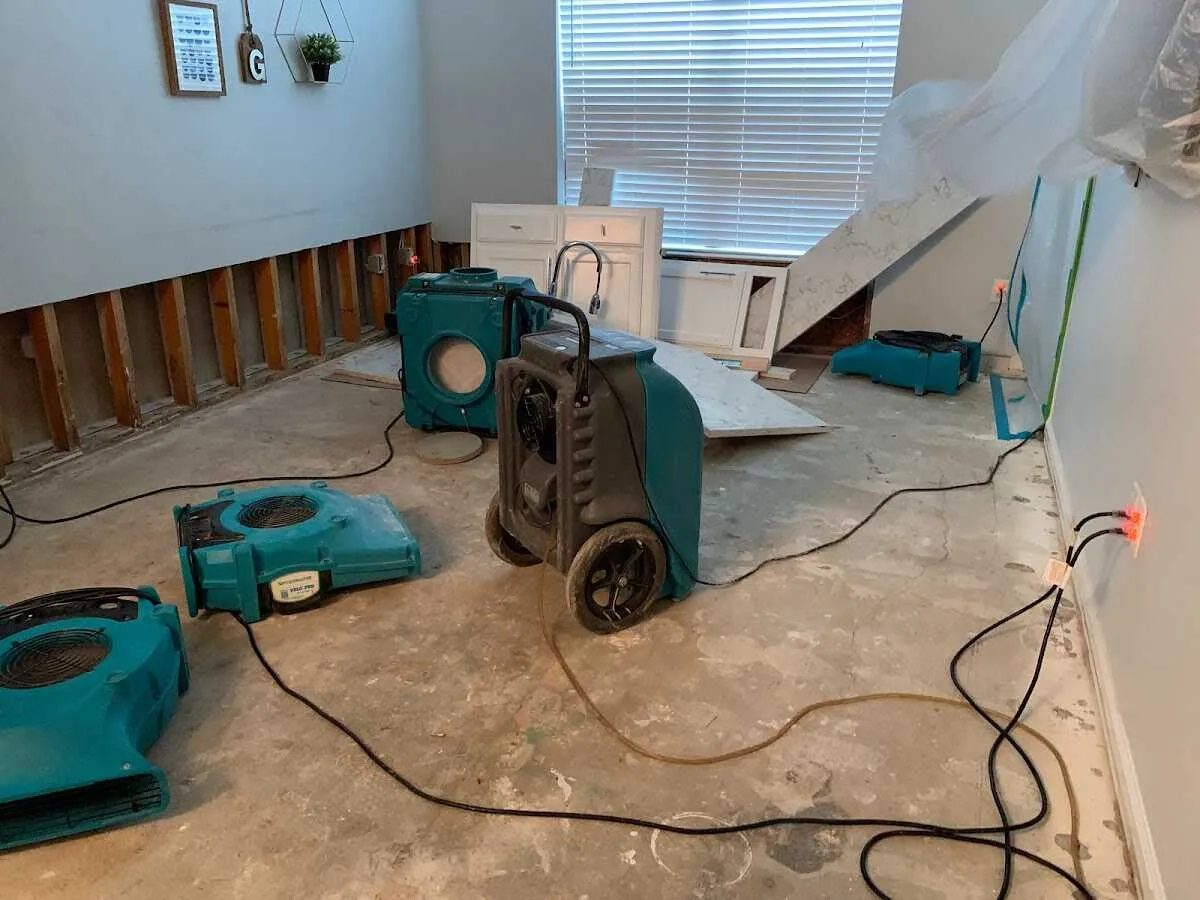 Dehumidifier in flood-cut room for Water Damage Restoration in Frankfort